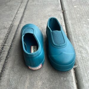 Excellent condition. Blue rain shoe
